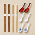 Dark bamboo and light wood chopsticks with bicolor black-outside red-inside, white, and blue-and-white hooked soup spoon choices